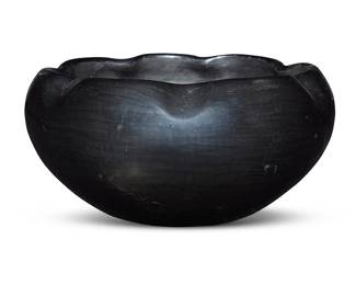1065 Desideria Montoya Sanchez (1889-1982, San Ildefonso Pueblo) A blackware pottery bowl With piecrust crimped rim Incised signature to underside: Desideria Height 3 3/4 in., diameter 8 1/4 in. Estimate: $300 - $500