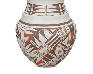 1036 Joy Navasie (Frog Woman) (1919-2012, Hopi-Tewa) A polychrome pottery vase With red and brown geometric motifs on white slip ground Painted with artist's frog device to underside Height 9 in., diameter 7 1/2 in. Estimate: $500 - $800