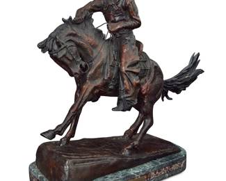 1309 After Frederic Remington (1861-1909) "The Cowboy," conceived 1905 Patinated bronze on mixed marble plinth Edition: 1/50 Signed in the casting: Frederic Remington; impressed edition Height of bronze 20 7/8 in., width 25 7/8 in., depth 7 7/8 in.; height overall 22 3/4 in., width 25 7/8 in., depth 9 in. Estimate: $400 - $600