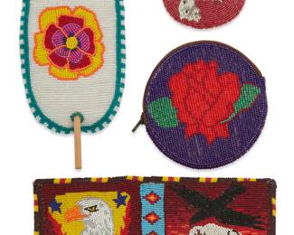 1122 Four contemporary Native American polychrome pictorial beaded items Late 20th/21st century Comprising two hair ornaments, including a large white, green, and multicolored floral hair slide, and a small red and white oval hair barrette with a polar bear and cub, as well as a red and purple round change purse, and a multicolored beaded Nocona folding wallet featuring a white buffalo and raven, with an eagle head verso The smallest with maker's mark verso 4 pieces Largest 4 x 6 3/4 in.; smallest 2 1/2 x 3 1/8 in. Estimate: $200 - $300