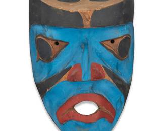 1147 A Northwest Coast polychrome carved cedar mask Third quarter 20th century Unmarked Height 10 1/2 in., width 7 1/4 in., depth 6 in. Estimate: $200 - $400