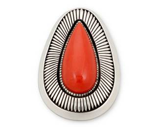 1355 Herman Vandever (b. 1964, Diné [Navajo]) A sterling silver and set coral teardrop pendant with fine line sunburst stampwork Etched signature verso 2 3/8 x 1 1/2 in. 61.7 grams gross Estimate: $300 - $500