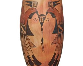 1034 Priscilla Namingha Nampeyo (1924-2008, Hopi-Tewa) A polychrome pottery yellowware vase Painted with four red and brown parrot motifs on cream slip ground Signed to underside: Priscilla Namingha Nampeyo Height 11 1/2 in., diameter 5 1/2 in. Estimate: $500 - $700