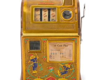 1307 An O. D. Jennings 'Dutch Boy' slot machine Circa 1925 The ten-cent machine with three reels, housed in a metal and wood case Numbered to upper area: 72346 / 644 Height 24 1/2 in., width 16 in., depth 14 1/4 in. Estimate: $700 - $1,000