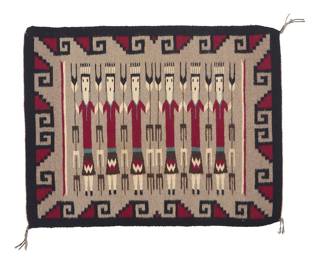 1295 A Diné (Navajo) Yei rug Second half 20th century, attributed to Eva Jem, Diné Woven in grey, black, dark red, cream, and turquoise blue wool featuring six Yei dancers to the center and with a complex stepped border to each side 3 ft. x 2 ft. 3 1/2 in. approximately Estimate: $300 - $500