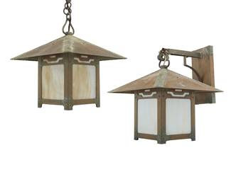 1316 Two Old California Lantern Co. Arts & Crafts style lanterns 2003 and 2008 The patinated brass cases with slag glass panels housing a single light, one hanging from arm issued from wall-mounted escutcheon, the other ceiling mounted issued from chain, electrified Ceiling with factory metal label applied to escutcheon; each dated; wall-mounted with applied paper label with model number: #1-184 2 pieces Heigh of each lantern only 17 3/4 in., width 16 in., depth 16 in.; ceiling overall height 26 in.; wall-mounted depth from wall 18 1/2 in. Estimate: $300 - $500