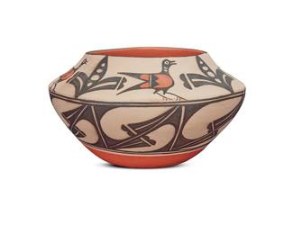 1061 Arthur & Hilda Coriz (1948-1998 & 1949-2007, Santo Domingo) A polychrome pottery jar With black and red roadrunner and raincloud motifs on white slip ground Incised signature to underside: Arthur & Hilda Coriz / [olla cipher] Height 7 in., diameter 12 5/8 in. Estimate: $400 - $600