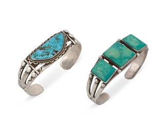 1372 Two Diné (Navajo) sterling silver and turquoise cuff bracelets Mid-20th century Each sterling cuff with a pierced and stamped band, the first centering a single oblong turquoise; the second set with three rectangular turquoise, and each with silver ball accents Each unmarked The first 6 1/2 in. total inner C x 3/4 in., including a 1 in. gap; the second 6 3/4 in. total inner C x 7/8 in., including a 1 in. gap 69.6 grams gross Estimate: $1,000 - $1,500