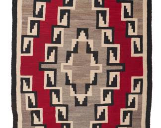 1268 A Diné (Navajo) Ganado rug Mid-20th century Woven in cream, red, black and mottled brown wool with multiple central elaborate stepped concentric diamonds with stepped hook details and banded borders 5 ft. 10 in. x 3 ft. 7 in. approximately Estimate: $700 - $900
