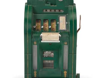 1300 A Mills novelty 'Page Boy Extraordinary' slot machine 1930s The five-cent machine with three reels, housed in an enameled metal and wood case, raised on a glazed wood locking cabinet with single shelf and silver-toned metal paw feet Height of machine 29 in., width 17 in., depth 15 3/4 in.; height of cabinet 34 1/4 in., width 20 in., depth 20 in. Estimate: $800 - $1,200