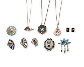 1334 Ten Zuni-style sterling silver and stone inlay jewelry items Late 20th century Ten works by various artists in geometric or figural multistone inlay including turquoise, coral, mother of pearl, lapis lazuli, and malachite, featuring two stone inlay pendant necklaces, three pendant brooches, two with associated chains including a mosaic inlay bear face pendant/brooch by Paul Peyketewa Jr (Zuni), and a Sunface pendant/brooch with dangles by Beverly Weebothee (Zuni), as well as four multistone inlay rings, one a geometric inlay ring by Ray Jack (Diné [Navajo]), and a pair of multistone inlay earrings by Sheryl or Strallie Edaakie (Zuni) Variously marked for artist: P.P.J. Zuni / Henry and Linda Barber / S Edaakie [script] Zuni / Bw [script] / Sec [ec within S] / MT Panteah Zuni / RAJack; three stamped: Sterling 11 pieces Pendants/brooches 1 3/4 in. to 3/4 in.; ring sizes 8 1/4 to 6 1/2; earrings 1/2 in. 79.4 grams gross Estimate: $300 - $500
