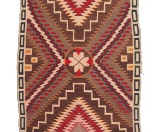 1220 A Diné (Navajo) pictorial weaving Early/mid-20th century A narrow throw finely woven in red, brown, cream, grey, and orange wool with wool warps, featuring a central roundel with arrow motifs and serrated zigzags with feather motifs, as well as larger serrated zigzags to each end with floating serrated diamonds 5 ft. 3 1/2 in. x 2 ft 4 1/2 in. approximately Estimate: $300 - $500