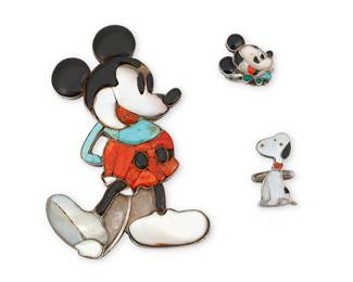 1335 Three sterling silver and multistone inlay cartoon-themed figural jewelry items Three works: Veronica Poblano Nastacio (b. 1951, Zuni) A cartoon mouse sculptural stone inlay ring including turquoise, coral, jet and mother of pearl, circa 1973 With etched signature and date verso Ring size 7 A large classic cartoon mouse standing figure stone inlay belt buckle/concho with turquoise, coral, jet and mother of pearl, as well as a Snoopy-style figural dog stone inlay ring with mother of pearl and coral Each unmarked 2 pieces Buckle/concho 4 x 2 5/8 in., belt loop 1 3/8 in.; ring size 4 3 pieces total 91.2 grams gross Estimate: $300 - $500