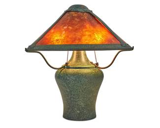 1258 A Mica Lamp Co. table lamp Late 20th/early 21st century With a bulbous-shaped verdigris patinated copper base, three arms, and three light, surmounted by a copper and mica three-paneled shade, electrified Label to underside: Mica Lamp Company / Glendale, CA; further stamped with company logo; shade with applied label numbered: 961662 Height overall 18 1/2 in.; height of base 17 5/8 in., width 15 1/4 in., depth 13 3/4 in.; height of shade 7 1/4 in., diameter 17 1/4 in. Estimate: $400 - $600