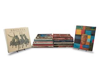 1428 A group of Western Art books and reference materials Second half 20th century-early 21st century Comprising hardcover books, American Indian Art Magazines, and Western Art auction catalogues 28 pieces Height of largest 11 in., width 11 7/8 in., width 1 3/4 in. Estimate: $100 - $200