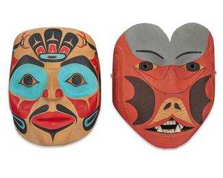1148 Two Northwest Coast polychrome carved wood masks Two works: Ray Holt (20th century, Tsimshian; Metlakatla, AK) An 'Eagle Spirit" mask with blue, red, and black painted stylized features, circa 1986 Signed and dated in ink verso, possibly in another hand; titled to attached tag Height 9 7/8 in., width 8 in., depth 5 in. approximately A 'Man transforming into a Cougar' transformative mask with grey, red, and black painted features and teeth Signed verso with incised hand pictograph; titled to attached tag Height 10 3/4 in., width 9 3/8 in., depth 5 1/4 in. approximately 2 pieces Estimate: $300 - $500