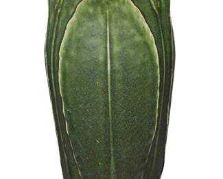 1096 A Grueby Faience Company two color glazed earthenware vase Early 20th century Of foliate form, with green glaze and yellow buds Impressed to underside: GREUBY POTTERY / BOSTON USA Height 7 3/4 in., diameter 4 3/4 in. Estimate: $1,800 - $2,500