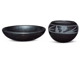 1068 Santana & Adam Martinez (1909-2002 & 1904-2000) Two blackware pottery vessels Comprising a low bowl and a round jar with black on black painted band of stepped and geometric motifs to shoulder Each incised to underside: Santana / Adam 2 pieces Height of bowl 2 1/8 in., diameter 7 1/2 in.; height of jar 3 1/4 in., diameter 5 1/4 in. Estimate: $300 - $500