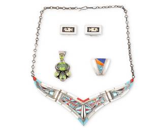 1404 Four Southwest-style sterling silver jewelry items Four works:  Roie Jaque (20th century, Diné [Navajo]) A sterling silver and green gemstone cluster set pendant Stamped: Roie Jaque / Sterling 2 x 1 in.  A sterling silver and multistone intricate mosaic inlay collar link necklace with turquoise, coral, and mother of pearl, as well as a modernist-style small silver and turquoise, coral, and lapis lazuli stone inlay pendant/brooch, and a pair of sterling silver cufflinks each with a shadow set stylized bird motif in 18k gold overlay Necklace stamped: Sterling; cuff links stamped: 925 / 18K 4 pieces Necklace 20 1/2 x 1 5/8 in.; brooch/pendant 1 x 1 1/8 in.; cuff links 5/8 x 1 in.  5 pieces total 72.8 grams gross Estimate: $200 - $300