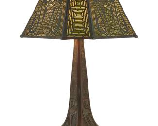 1195 A Tiffany Studios Favrile glass and bronze 'Chinese' table lamp Early 20th century With Chinese archaic-style filigree metal overlay, on a patinated bronze base issuing two Leviton lights, electrified Shade impressed: TIFFANY STUDIOS NEW YORK 1588; base impressed: TIFFANY STUDIOS / NEW YORK / 535 Height overall 16 3/4 in., width 10 1/8 in., depth 10 1/8 in. Estimate: $2,000 - $4,000