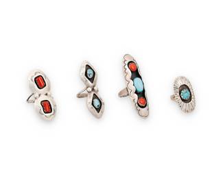 1376 Four Southwest sterling silver and turquoise rings Mid/late 20th century A group of shadow set sterling silver rings with set turquoise and set coral, including a double set coral ring by Valerie Goodluck (Diné [Navajo]) One marked for artist; further marked: Sterling 4 pieces Ring sizes 9 3/4 to 4 27.4 grams gross Estimate: $200 - $400