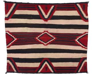 1272 A Diné (Navajo) third phase revival textile Mid-20th century Woven in red, cream, brown, and dark blue wool with contrast and striped banding and stepped diamonds 6 ft. 2 1/2 in. x 5 ft. 3 in. approximately Estimate: $700 - $900