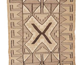 1266 A Diné (Navajo) regional rug Mid-20th century Woven in tan, dark brown, cream, and pale mottled brown wool with a central stepped X-form and further triangle motifs all within a complex hooked border 4 ft.10 1/2 in. x 3 ft. 1 in. approximately Estimate: $500 - $700