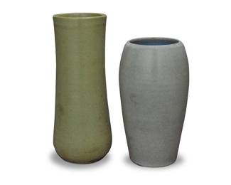 1098 Two Marblehead glazed earthenware vases Early 20th century One with impressed cipher to underside, the other with applied factory label and mark obscured by glaze 2 pieces Height of taller 10 7/8 in., diameter 4 1/2 in.; height of shorter 9 in., diameter 5 1/8 in. Estimate: $500 - $700