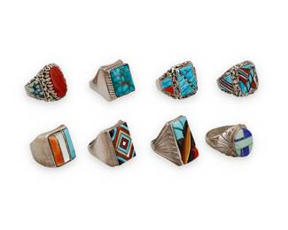1412 Eight large Southwest silver and stone set rings Mid/late 20th century A group of chunky sterling silver rings, including two by Lee & Mary Weebothee (Zuni), one with elaborate coral and turquoise geometric inlay and nugget silver accents, and one with set coral and turquoise, as well as a large ring with elaborate sculptural turquoise and coral inlay and nugget silver accents, and a multistone sculptural inlay ring by Richard & Geneva Terrazas (Mexican & Zuni), together with three further rings with multistone inlay and a large ring with set square turquoise Four variously marked for artist: Lee/Mary Zuni / R. & G. T. / E; two marked Sterling 8 pieces Ring sizes 13 1/2 to 8 132.6 grams gross Estimate: $400 - $600