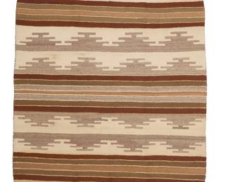 1288 A Diné (Navajo) Chinle/Wide Ruins rug Second half 20th century Woven in mottled grey, cream, pale brown, and russet wool featuring alternating stepped motif and stripe banding 4 ft. x 3 ft. 2 in. approximately Estimate: $300 - $500
