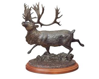 1234 Ott Jones (b. 1959) "Number One" (caribou), 1987 Patinated bronze on marble base on rotating wood plinth Edition: 1/28 Signed, dated, and numbered in the casting: OttJones / © Height of bronze 17 1/4 in., width 18 3/4 in., depth 13 1/2 in.; height overall 19 1/4 in. Estimate: $500 - $700