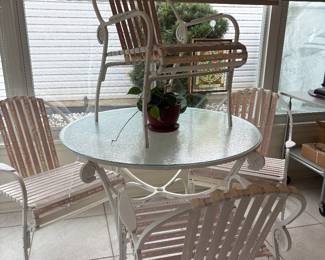 Vintage wrought iron glass-top patio table