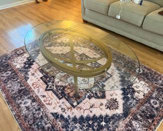 Glass coffee table 52” W x 16” H x 34” D