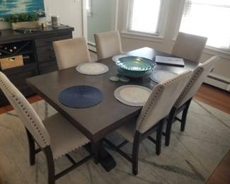 Dining set seats 8 (extra leaf & chairs available but not shown); area rug