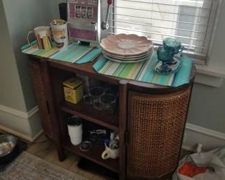 Art deco-inspired curved rattan console