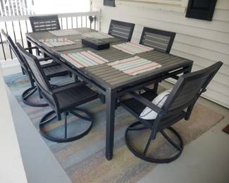 Patio dining set seats 6; all-weather rugs