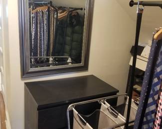 Wall mirror; black 3-drawer chest