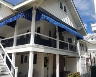 Navy & white awnings; railings