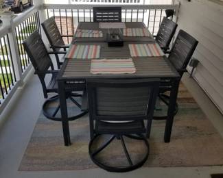 Patio dining set seats 6; all-weather rugs