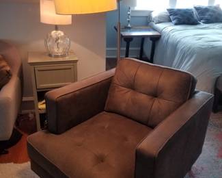 Comfy arm chair; fabulous floor lamp. End table; table lamp