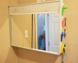 Mirrored medicine cabinet