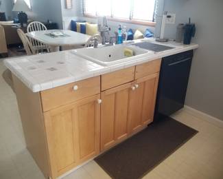 Kitchen features a peninsula; BOSCH dishwasher