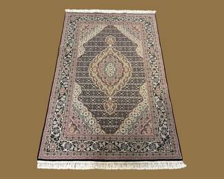 Blue-gray traditional rug with diamond medallion and ornate border.