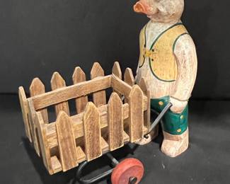 Anthropomorphic Pig with Wheelbarrow Figurine Style