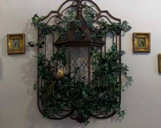metal wall hanging ornate birdcage design entwined with faux ivy and a small framed Bird Prints
