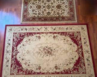 two beautifully coordinated traditional PersianOriental style area rugs