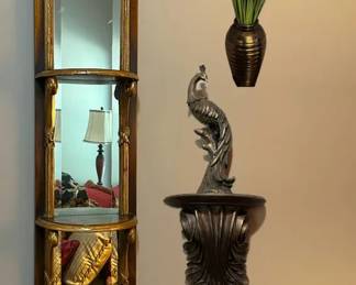 Theodore Alexander Wall Mirror, Vase With Faux Foliage And A Decorative Sconce With Peacock On Top
