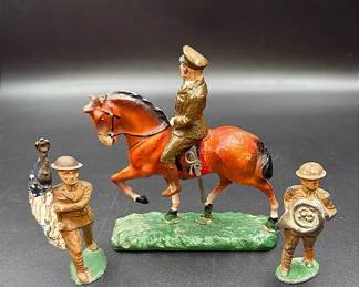 WWI Military Figurines Featuring A Solider On Horseback, A Military Band Member And A Flagbearer