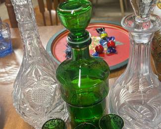 All kinds of collectible and usable glass including these decanters 