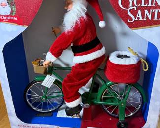 Mr. Christmas Super Cycling Santa ($45)